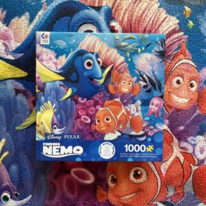 Puzzle Ceaco 1000 "Finding Nemo" + Plakat