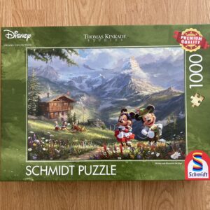Puzzle Schmidt 1000 "Mickey and Minnie in the Alps"